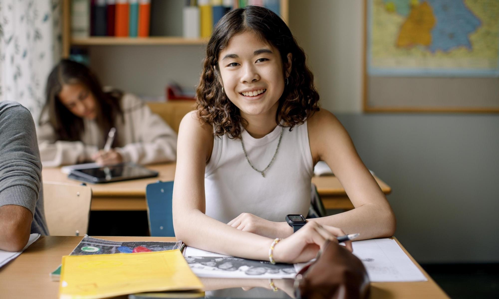 Teenager studying in classroom